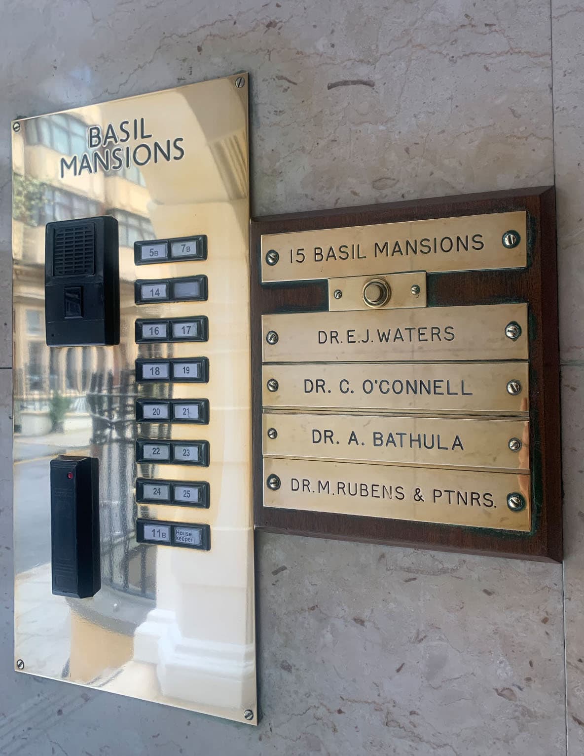Knightsbridge Doctors brass nameplate at Basil Mansions